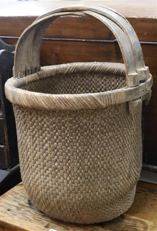 A Chinese wood and wickerwork basket, W.38cm